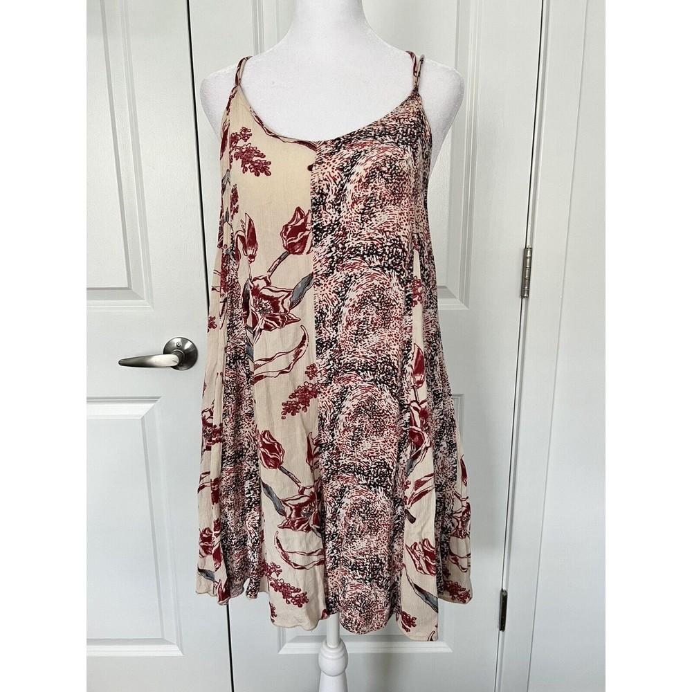 Free People Isabella Mixed Print Romper Cross Back Tie Details Flowy size Large